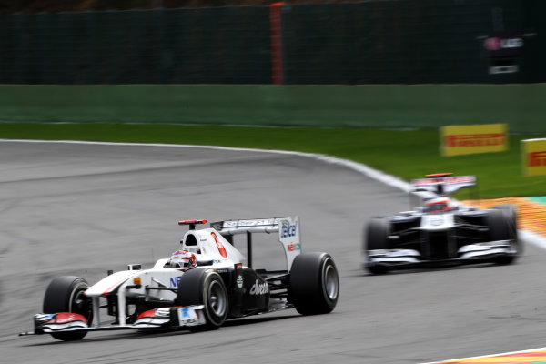 Spa-Francorchamps, Spa, Belgium
28th August 2011.
Kamui Kobayashi, Sauber C30 Ferrari, 12th position, leads Rubens Barrichello, Williams FW33 Cosworth, 16th position. Action. 
World Copyright: Andy Hone/LAT Photographic
ref: Digital Image CI0C2401