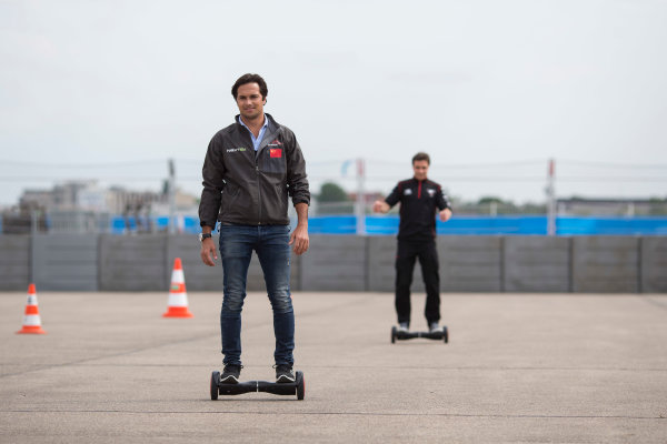 2014/2015 FIA Formula E Championship.
Berlin ePrix, Berlin Tempelhof Airport, Germany.
Thursday 21 May 2015
Nelson Piquet Jr (BRA)/China Racing - Spark-Renault SRT_01E and Jerome D'Ambrosio (BEL)/Dragon Racing - Spark-Renault SRT_01E on hovertrax.
Photo: Andrew Ferraro/LAT/Formula E
ref: Digital Image _FER0863
2014/2015 FIA Formula E Championship.
Berlin ePrix, Berlin Tempelhof Airport, Germany.
Thursday 21 May 2015
Nelson Piquet Jr (BRA)/China Racing - Spark-Renault SRT_01E and Jerome D'Ambrosio (BEL)/Dragon Racing - Spark-Renault SRT_01E on hovertrax.
Photo: Andrew Ferraro/LAT/Formula E
ref: Digital Image _FER0863