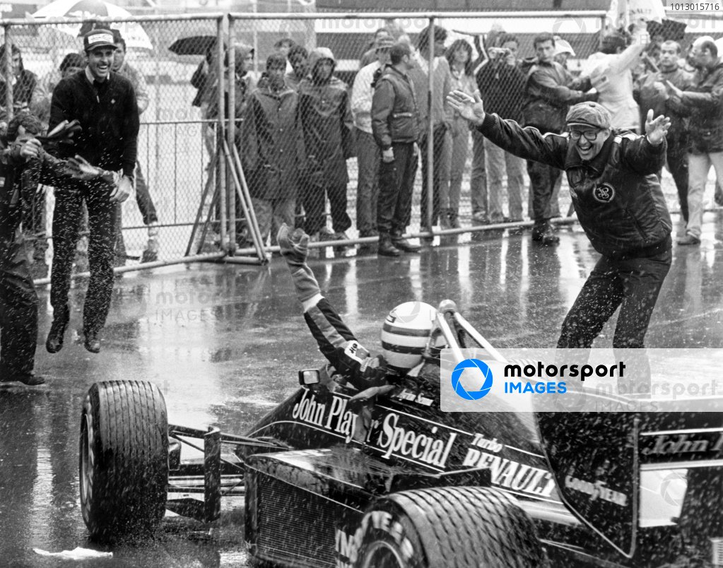 1985 Portuguese Grand Prix.Estoril, Portugal. 19-21 April 1985.Ayrton Senna (Lotus 97T-Renault) celebrates 1st position with Team Manager Peter Warr (right) in parc ferme.World Copyright: LAT PhotographicRef: BATPOR7 1985 Portuguese Grand Prix.Estoril, Portugal. 19-21 April 1985.Ayrton Senna (Lotus 97T-Renault) celebrates 1st position with Team Manager Peter Warr (right) in parc ferme.World Copyright: LAT PhotographicRef: BATPOR7