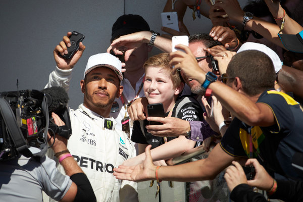 Circuit of the Americas, Austin, Texas, United States of America.
Sunday 22 October 2017.
Lewis Hamilton, Mercedes AMG, 1st Position, celebrates on the podium.
World Copyright: Steve Etherington/LAT Images 
ref: Digital Image SNE19753