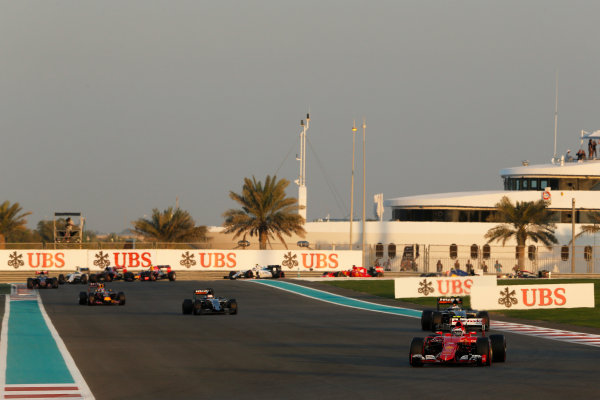 Yas Marina Circuit, Abu Dhabi, United Arab Emirates.
Sunday 29 November 2015.
Kimi Raikkonen, Ferrari SF-15T, leads Sergio Perez, Force India VJM08 Mercedes, Nico Hulkenberg, Force India VJM08 Mercedes, and Daniel Ricciardo, Red Bull Racing RB11 Renault.
World Copyright: Charles Coates/LAT Photographic
ref: Digital Image _99O1838