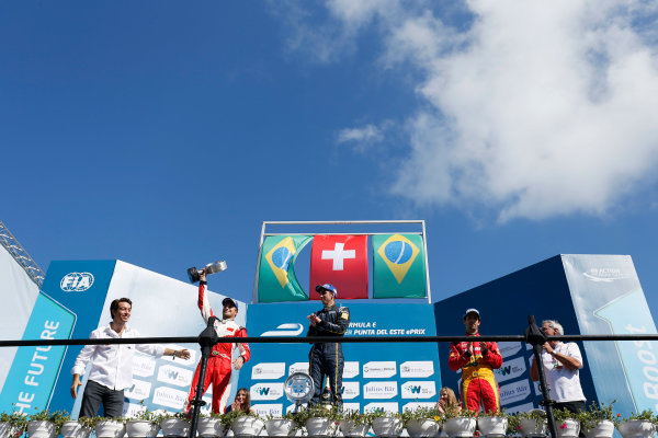2014 FIA Formula E Championship.
Punta del Este ePrix, Uruguay.
Podium. Sebastien Buemi (SWI)/E.dams Renault - Spark-Renault SRT_01E (first position), Nelson Piquet Jr (BRA)/China Racing - Spark-Renault SRT_01E (second position) and Lucas di Grassi (BRA)/Audi Abt Sport - Spark-Renault SRT_01E (third position).
Photo: Zak Mauger/LAT/FE
ref: Digital Image _L0U1919 2014 FIA Formula E Championship.
Punta del Este ePrix, Uruguay.
Podium. Sebastien Buemi (SWI)/E.dams Renault - Spark-Renault SRT_01E (first position), Nelson Piquet Jr (BRA)/China Racing - Spark-Renault SRT_01E (second position) and Lucas di Grassi (BRA)/Audi Abt Sport - Spark-Renault SRT_01E (third position).
Photo: Zak Mauger/LAT/FE
ref: Digital Image _L0U1919