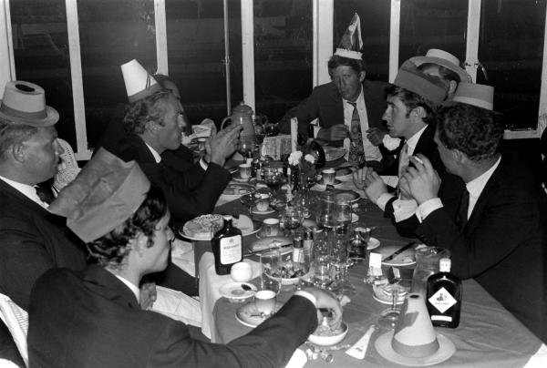 Drivers and team personnel enjoy a New Year's Eve celebration. Amongst the revellers are Jochen Rindt (AUT) (top right), Jackie Stewart (GBR) (centre right), Jacky Ickx (BEL) (Bottom Left) and Colin Chapman (Centre Left).
South African Grand Prix, Kyalami, South Africa, 1 January 1968. Drivers and team personnel enjoy a New Year's Eve celebration. Amongst the revellers are Jochen Rindt (AUT) (top right), Jackie Stewart (GBR) (centre right), Jacky Ickx (BEL) (Bottom Left) and Colin Chapman (Centre Left).
South African Grand Prix, Kyalami, South Africa, 1 January 1968.