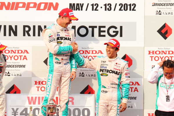 Twin Ring Motegi, Motegi, Japan
12th - 13th May 2012. Rd 2.
Winner Andre Lotterer ( #36 PETRONAS TEAM TOM'S ) & 3rd position Kazuki Nakajima ( #2 PETRONAS TEAM TOM'S ) podium
World Copyright: Yasushi Ishihara/LAT Photographic
ref: Digital Image 2012FN_R2_009 Twin Ring Motegi, Motegi, Japan
12th - 13th May 2012. Rd 2.
Winner Andre Lotterer ( #36 PETRONAS TEAM TOM'S ) & 3rd position Kazuki Nakajima ( #2 PETRONAS TEAM TOM'S ) podium
World Copyright: Yasushi Ishihara/LAT Photographic
ref: Digital Image 2012FN_R2_009