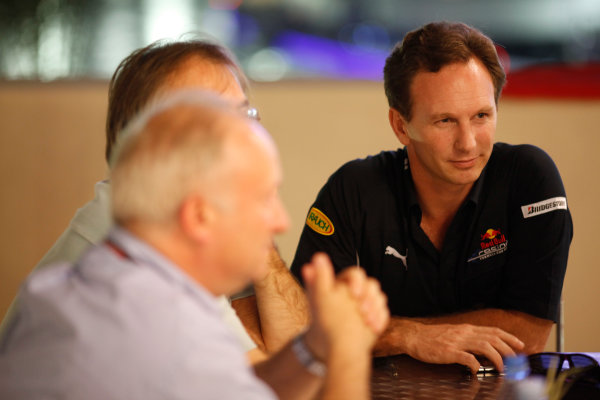 Yas Marina Circuit, Abu Dhabi, United Arab Emirates
31st October 2009.
Tony Dodgins, Autosport Journalist with Mark Hughes, Autosport Journalist, Chritian Horner, Team Principal, Red Bull Racing in conversation around a table, portrait.
World Copyright: Glenn Dunbar/LAT Photographic 
ref: Digital Image GD5D8836