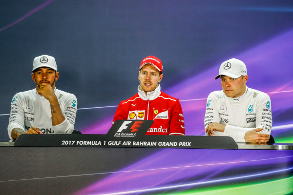 Bahrain International Circuit, Sakhir, Bahrain. 
Sunday 16 April 2017.
Lewis Hamilton, Mercedes AMG, 2nd Position, Sebastian Vettel, Ferrari, 1st Position, and Valtteri Bottas, Mercedes AMG, 3rd Position, in the Press Conference.
World Copyright: Sam Bloxham/LAT Images
ref: Digital Image _W6I3344