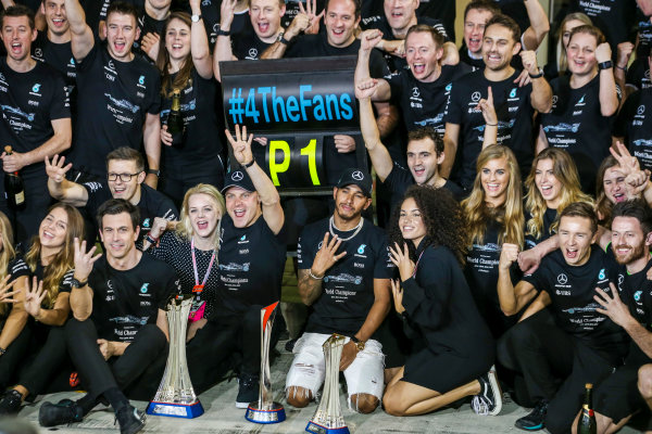 Yas Marina Circuit, Abu Dhabi, United Arab Emirates.
Sunday 26 November 2017.
Valtteri Bottas, Mercedes AMG, 1st Position, Lewis Hamilton, Mercedes AMG, 2nd Position, family, friends and the Mercedes team celebrate victory.
World Copyright: Charles Coates/LAT Images
ref: Digital Image AN7T2734 Yas Marina Circuit, Abu Dhabi, United Arab Emirates.
Sunday 26 November 2017.
Valtteri Bottas, Mercedes AMG, 1st Position, Lewis Hamilton, Mercedes AMG, 2nd Position, family, friends and the Mercedes team celebrate victory.
World Copyright: Charles Coates/LAT Images
ref: Digital Image AN7T2734