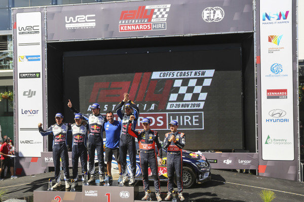 (L to R): Second placed Sebastien Ogier (FRA) / Julien Ingrassia (FRA), Volkswagen Motorsport WRC, rally winners Andreas Mikkelsen (NOR) / Anders Jaeger Synnevag (NOR), Volkswagen Motorsport II WRC and third placed Thierry Neuville (BEL) / Nicolas Gilsoul (BEL), Hyundai Motorsport N WRC celebrate on the podium at FIA World Rally Championship, Rd13, Rally Australia, Day Three, Coffs Harbour, New South Wales, Australia, 20 November 2016. (L to R): Second placed Sebastien Ogier (FRA) / Julien Ingrassia (FRA), Volkswagen Motorsport WRC, rally winners Andreas Mikkelsen (NOR) / Anders Jaeger Synnevag (NOR), Volkswagen Motorsport II WRC and third placed Thierry Neuville (BEL) / Nicolas Gilsoul (BEL), Hyundai Motorsport N WRC celebrate on the podium at FIA World Rally Championship, Rd13, Rally Australia, Day Three, Coffs Harbour, New South Wales, Australia, 20 November 2016.