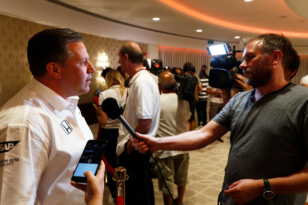 Bahrain International Circuit, Sakhir, Bahrain. 
Wednesday 12 April 2017.
Zak Brown, Executive Director, McLaren Technology Group talks to the media after announcing Fernando Alonso's deal to race in the 2017 Indianapolis 500 in an Andretti Autosport run McLaren Honda car.
World Copyright: Glenn Dunbar/LAT Images
ref: Digital Image _X4I0254