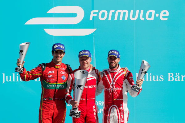 2016/2017 FIA Formula E Championship.
Round 7 - Berlin ePrix, Tempelhof Airport, Berlin, Germany.
Saturday 10 June 2017.Lucas Di Grassi (BRA), ABT Schaeffler Audi Sport, Spark-Abt Sportsline, ABT Schaeffler FE02, Felix Rosenqvist (SWE), Mahindra Racing, Spark-Mahindra, Mahindra M3ELECTRO, and Nick Heidfeld (GER), Mahindra Racing, Spark-Mahindra, Mahindra M3ELECTRO, on the podium.
Photo: Zak Mauger/LAT/Formula E
ref: Digital Image _54I7682