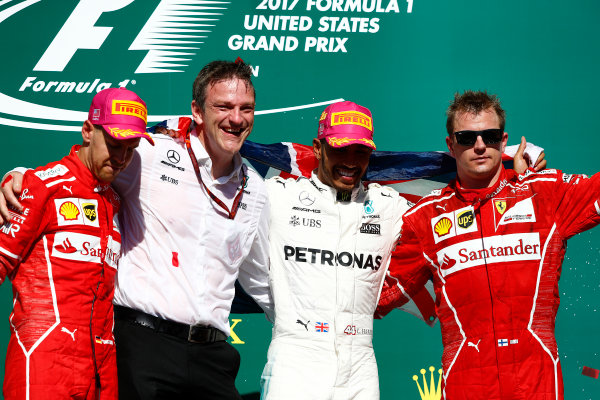 Circuit of the Americas, Austin, Texas, United States of America.
Sunday 22 October 2017.
Sebastian Vettel, Ferrari, 2nd Position, James Allison, Technical Director, Mercedes AMG, Lewis Hamilton, Mercedes AMG, 1st Position, and Kimi Raikkonen, Ferrari, 3rd Position, on the podium.
World Copyright: Zak Mauger/LAT Images 
ref: Digital Image _ONZ8773