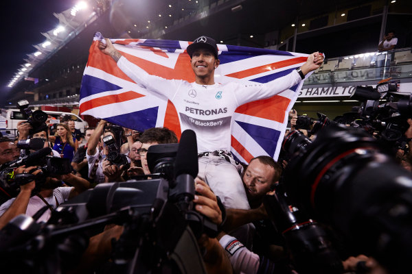 Yas Marina Circuit, Abu Dhabi, United Arab Emirates.
Sunday 23 November 2014. 
Lewis Hamilton, Mercedes AMG, celebrates championship victory. 
World Copyright: Steve Etherington/LAT Photographic.
ref: Digital Image SNE13432