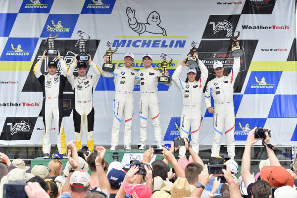 #25 BMW Team RLL BMW M8, GTLM: Alexander Sims, Connor de Phillippi, #3 Corvette Racing Chevrolet Corvette C7.R, GTLM: Antonio Garcia, Jan Magnussen, #24 BMW Team RLL BMW M8 GTLM: John Edwards, Jesse Krohn celebrate the win on the podium