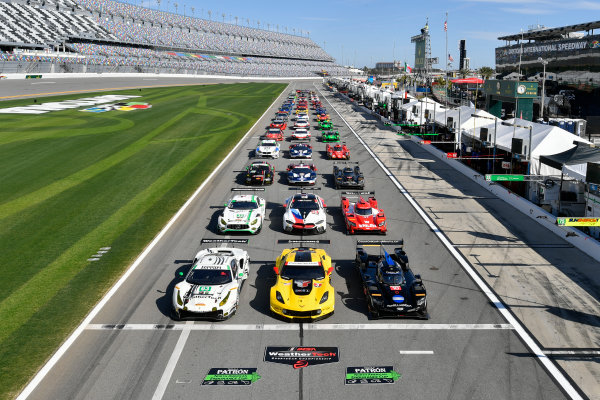 IMSA WeatherTech SportsCar Championship
Rolex 24 Hours
Daytona Beach, Florida, USA
Wednesday 24 January 2018
#63 Scuderia Corsa Ferrari 488 GT3, GTD: Cooper MacNeil, Alessandro Balzan, Gunnar Jeannette, Jeff Segal, #3 Corvette Racing Chevrolet Corvette C7.R, GTLM: Antonio Garcia, Jan Magnussen, Mike Rockenfeller, #10 Wayne Taylor Racing Cadillac DPi, P: Renger van der Zande, Jordan Taylor, Ryan Hunter-Reay Full field group shot for the 2018 Rolex 24 Hour Race
World Copyright: Scott R LePage
LAT Images

ref: Digital Image lepage-180124-day-0067