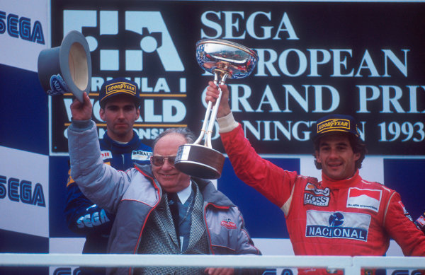 1993 European Grand Prix.
Donington Park, England.
9-11 April 1993.
Ayrton Senna (McLaren Ford) 1st position and Damon Hill (Williams Renault) 2nd position on the podium. Circuit owner Tom Wheatcroft also stands on the podium.
Ref-93 EUR 01.
World Copyright - LAT Photographic

