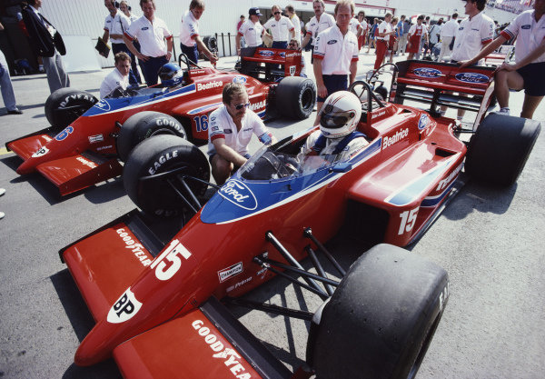 Alan Jones, Haas Lola THL2 Ford, with team-mate Patrick Tambay. Adrian Newey can be seen on the far left of the picture.