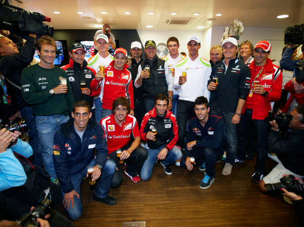 Spa-Francorchamps, Spa, Belgium
27th August 2011.
Michael Schumacher, Mercedes GP W02, celebrates the 20th anniversary of his first Grand Prix start at Spa with his fellow drivers. Portrait. Atmosphere. 
World Copyright: Steve Etherington/LAT Photographic
ref: Digital Image SNE27247