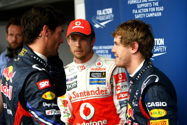 Interlagos, Sao Paulo, Brazil
26th November 2011
Top three qualifiers Sebastian Vettel, Red Bull Racing RB7 Renault, Mark Webber, Red Bull Racing RB7 Renault, and Jenson Button, McLaren MP4-26 Mercedes. Portrait. 
World Copyright: Andy Hone/LAT Photographic
ref: Digital Image CSP29766