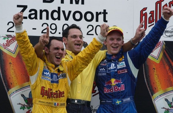 Double success for the Abt-Team with a win for Mattias Ekstrom (SWE), right, and the 2002 championship won by Laurent Aiello (FRA), left. Team Abt Sportsline team manager Hans-Jurgen Abt (GER).
DTM Championship, Rd9, Zandvoort, Holland. 29 September 2002.
DIGITAL IMAGE