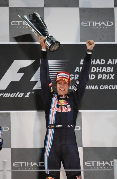 Yas Marina Circuit, Abu Dhabi, United Arab Emirates
1st November 2009.
Sebastian Vettel, Red Bull Racing RB5 Renault, 1st position, celebrates victory on the podium. Portrait. Podium. 
World Copyright: Steve Etherington/LAT Photographic
ref: Digital Image SNE17968