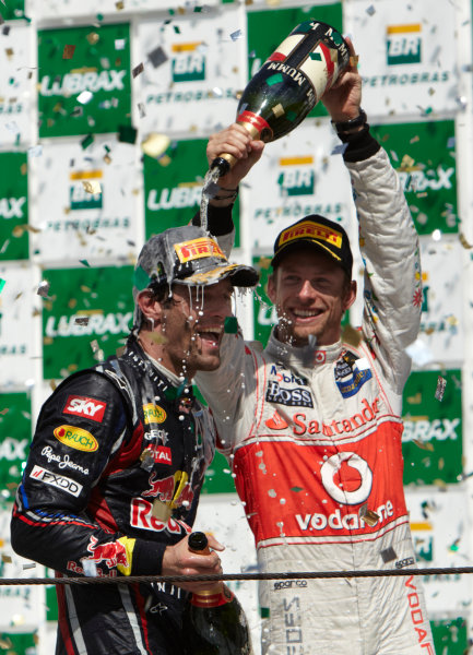 Interlagos, Sao Paulo, Brazil.
27th November 2011.
Mark Webber, Red Bull Racing RB7 Renault, 1st position, gets a soaking from Jenson Button, McLaren MP4-26 Mercedes, 3rd position. Portrait. Podium.
World Copyright: Steve Etherington/LAT Photographic
ref: Digital Image SNE28384 Interlagos, Sao Paulo, Brazil.
27th November 2011.
Mark Webber, Red Bull Racing RB7 Renault, 1st position, gets a soaking from Jenson Button, McLaren MP4-26 Mercedes, 3rd position. Portrait. Podium.
World Copyright: Steve Etherington/LAT Photographic
ref: Digital Image SNE28384
