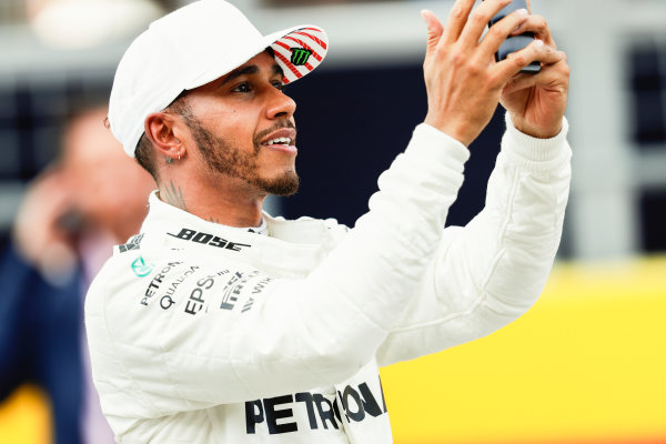 Circuit of the Americas, Austin, Texas, United States of America.
Saturday 21 October 2017.
Lewis Hamilton, Mercedes AMG, celebrates on the grid after securing pole.
World Copyright: Zak Mauger/LAT Images 
ref: Digital Image _56I1808