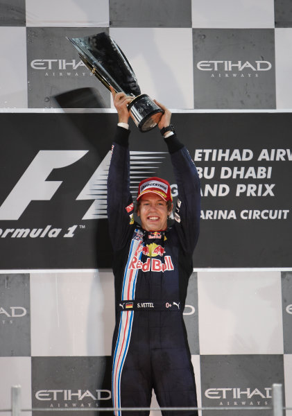 Yas Marina Circuit, Abu Dhabi, United Arab Emirates
1st November 2009.
Sebastian Vettel, Red Bull Racing RB5 Renault, 1st position, celebrates victory on the podium. Portrait. Podium. 
World Copyright: Steve Etherington/LAT Photographic
ref: Digital Image SNE17965