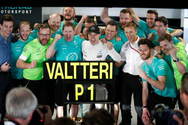 Sochi Autodrom, Sochi, Russia.
Sunday 30 April 2017.
Valtteri Bottas, Mercedes AMG, celebrates with colleagues, including Toto Wolff, Executive Director (Business), Mercedes AMG. 
World Copyright: Glenn Dunbar/LAT Images
ref: Digital Image _31I2225