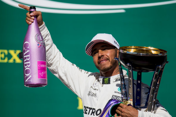Circuit of the Americas, Austin, Texas, United States of America.
Sunday 22 October 2017.
Lewis Hamilton, Mercedes AMG, 1st Position, with his pink Champagne bolt and trophy on the podium.
World Copyright: Zak Mauger/LAT Images
ref: Digital Image _X0W7308 Circuit of the Americas, Austin, Texas, United States of America.
Sunday 22 October 2017.
Lewis Hamilton, Mercedes AMG, 1st Position, with his pink Champagne bolt and trophy on the podium.
World Copyright: Zak Mauger/LAT Images
ref: Digital Image _X0W7308