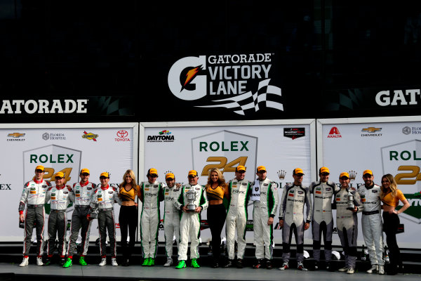 2017 Rolex 24 Hours.
Daytona, Florida, USA
Sunday 29 January 2017.
Podium GTD: Race winner #28 Alegra Motorsports Porsche 911 GT3 R: Daniel Morad, Jesse Lazare, Carlos de Quesada, Michael de Quesada, Michael Christensen, second place #29 Montaplast by Land-Motorsport Audi R8 LMS GT3: Connor de Phillippi, Christopher Mies, Jules Gounon, Jeffrey Schmidt; third place #33 Riley Motorsports Mercedes AMG GT3: Jeroen Bleekemolen, Ben Keating, Mario Farnbacher, Adam Christodoulou
World Copyright: Alexander Trienitz/LAT Images
ref: Digital Image 2017-24h-Daytona-AT1-6048 2017 Rolex 24 Hours.
Daytona, Florida, USA
Sunday 29 January 2017.
Podium GTD: Race winner #28 Alegra Motorsports Porsche 911 GT3 R: Daniel Morad, Jesse Lazare, Carlos de Quesada, Michael de Quesada, Michael Christensen, second place #29 Montaplast by Land-Motorsport Audi R8 LMS GT3: Connor de Phillippi, Christopher Mies, Jules Gounon, Jeffrey Schmidt; third place #33 Riley Motorsports Mercedes AMG GT3: Jeroen Bleekemolen, Ben Keating, Mario Farnbacher, Adam Christodoulou
World Copyright: Alexander Trienitz/LAT Images
ref: Digital Image 2017-24h-Daytona-AT1-6048