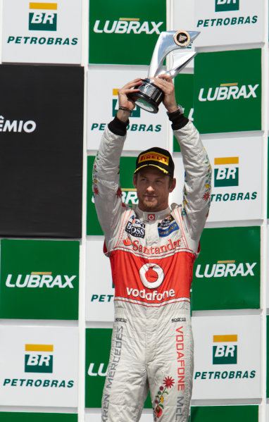 Interlagos, Sao Paulo, Brazil.
27th November 2011.
Jenson Button, McLaren MP4-26 Mercedes, 3rd position, lifts his trophy. Portrait. Podium.
World Copyright: Steve Etherington/LAT Photographic
ref: Digital Image SNE28328 Interlagos, Sao Paulo, Brazil.
27th November 2011.
Jenson Button, McLaren MP4-26 Mercedes, 3rd position, lifts his trophy. Portrait. Podium.
World Copyright: Steve Etherington/LAT Photographic
ref: Digital Image SNE28328