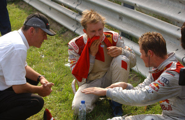 2004 DTM Championship
Zandvoort, Netherlands. 4th - 5th September.
Mattias Ekstrom (Abt Sportsline Audi A4) and Martin Tomczyk (Abt Sportsline Audi A4) discuss Peter Dumbreck's accident with Dr Wolfgang Ullrich (Audi).
World Copyright: Andre Irlmeier/LAT Photographic
ref: Digital Image Only