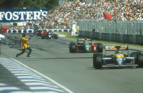 1990 Australian Grand Prix.
Adelaide, Australia.
2-4 November 1990.
Nelson Piquet (Benetton Ford) takes the chequered flag for 1st position, with Nigel Mansell (Ferrari 641) 2nd position not far behind.
Ref-90 AUS 06.
World Copyright - LAT Photographic
1990 Australian Grand Prix.
Adelaide, Australia.
2-4 November 1990.
Nelson Piquet (Benetton Ford) takes the chequered flag for 1st position, with Nigel Mansell (Ferrari 641) 2nd position not far behind.
Ref-90 AUS 06.
World Copyright - LAT Photographic