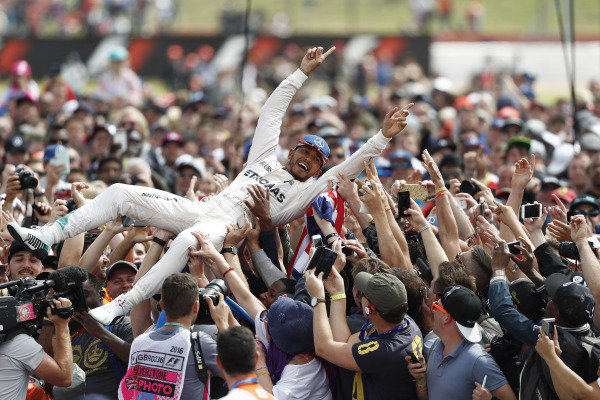 Silverstone, Northamptonshire, UK
Sunday 10 July 2016.
Lewis Hamilton, Mercedes AMG, 1st Position, celebrates with his home fans with a crowd surf.
World Copyright: Dunbar/LAT Photographic
ref: Digital Image _V2I1303 Silverstone, Northamptonshire, UK
Sunday 10 July 2016.
Lewis Hamilton, Mercedes AMG, 1st Position, celebrates with his home fans with a crowd surf.
World Copyright: Dunbar/LAT Photographic
ref: Digital Image _V2I1303