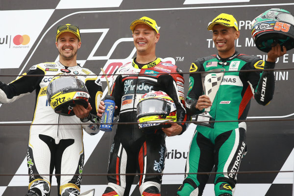 2017 Moto2 Championship - Round 13
Misano, Italy.
Sunday 10 September 2017
Podium: race winner Dominique Aegerter, Kiefer Racing, second place Thomas Luthi, CarXpert Interwetten, third place Hafizh Syahrin, Petronas Raceline Malaysia
World Copyright: Gold and Goose / LAT Images
ref: Digital Image 7892 2017 Moto2 Championship - Round 13
Misano, Italy.
Sunday 10 September 2017
Podium: race winner Dominique Aegerter, Kiefer Racing, second place Thomas Luthi, CarXpert Interwetten, third place Hafizh Syahrin, Petronas Raceline Malaysia
World Copyright: Gold and Goose / LAT Images
ref: Digital Image 7892