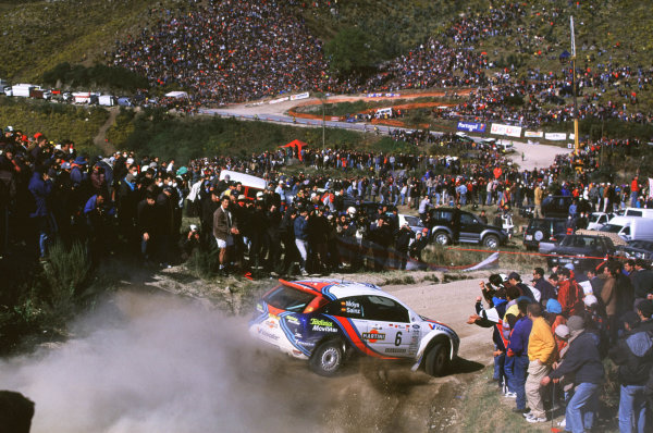 FIA World Rally Championship
Portuguese Rally, Porto, Portugal
16-19th March 2000.
Carlos Sainz and Luis Moya (Ford Focus) action.
World - LAT Photographic
Tel: +44 (0) 181 251 3000
Fax: +44 (0) 181 251 3001
e-mail: latdig@dial.pipex
com
FIA World Rally Championship
Portuguese Rally, Porto, Portugal
16-19th March 2000.
Carlos Sainz and Luis Moya (Ford Focus) action.
World - LAT Photographic
Tel: +44 (0) 181 251 3000
Fax: +44 (0) 181 251 3001
e-mail: latdig@dial.pipex
com