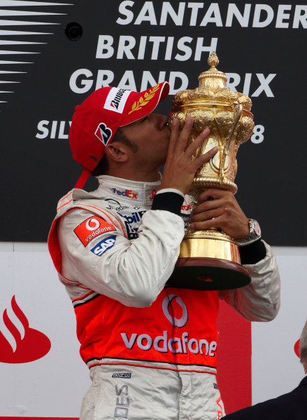 2008 British Grand Prix - Sunday Race
Silverstone, Northamptonshire, UK.
6th July 2008.
Lewis Hamilton, McLaren MP4-23 Mercedes, 1st position, celebrates victory on the podium. Portrait. Podium. 
World Copyright: Steve Etherington/LAT Photographic
ref: Digital Image SNE11103