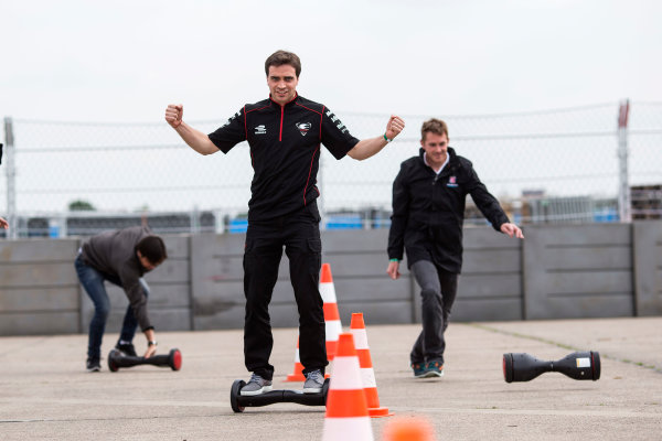 2014/2015 FIA Formula E Championship.
Berlin ePrix, Berlin Tempelhof Airport, Germany.
Thursday 21 May 2015
Scott Speed (USA)/Andretti Autosport - Spark-Renault SRT_01E, Nelson Piquet Jr (BRA)/China Racing - Spark-Renault SRT_01E and Jerome D'Ambrosio (BEL)/Dragon Racing - Spark-Renault SRT_01E on hovertrax.
Photo: Andrew Ferraro/LAT/Formula E
ref: Digital Image _FER0899
2014/2015 FIA Formula E Championship.
Berlin ePrix, Berlin Tempelhof Airport, Germany.
Thursday 21 May 2015
Scott Speed (USA)/Andretti Autosport - Spark-Renault SRT_01E, Nelson Piquet Jr (BRA)/China Racing - Spark-Renault SRT_01E and Jerome D'Ambrosio (BEL)/Dragon Racing - Spark-Renault SRT_01E on hovertrax.
Photo: Andrew Ferraro/LAT/Formula E
ref: Digital Image _FER0899
